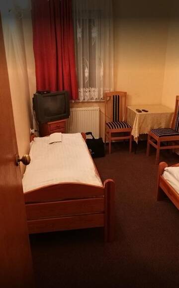 Фото номера Двухместный номер с 2 отдельными кроватями Отель EuroHotel г. Białe Błota 3